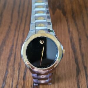 Movado Black Dial Watch with Silver and Gold Accents